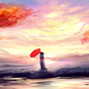 Woman in Black Jacket Standing on Rock Under Blue Sky