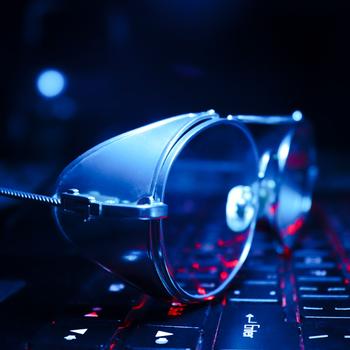 Sunglasses on Laptop Keyboard