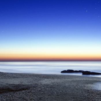 Blue sky stars beach sunrise rocks