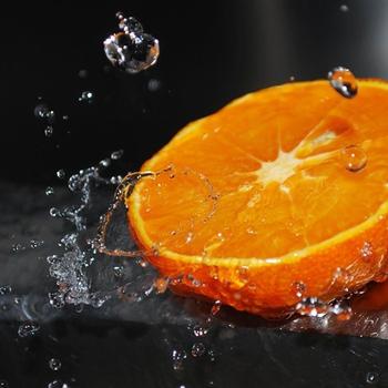 orange half water splashes citrus-food drinks ..