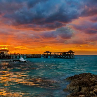 ocean sunset rocks shore - KDE Store