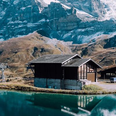 Brown Wooden House and Mountain Reflecting on Lake - KDE Store